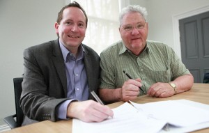 Councillor Keith Aspden with Cllr Peter Powell signing York’s Parish Charter at West Offices 